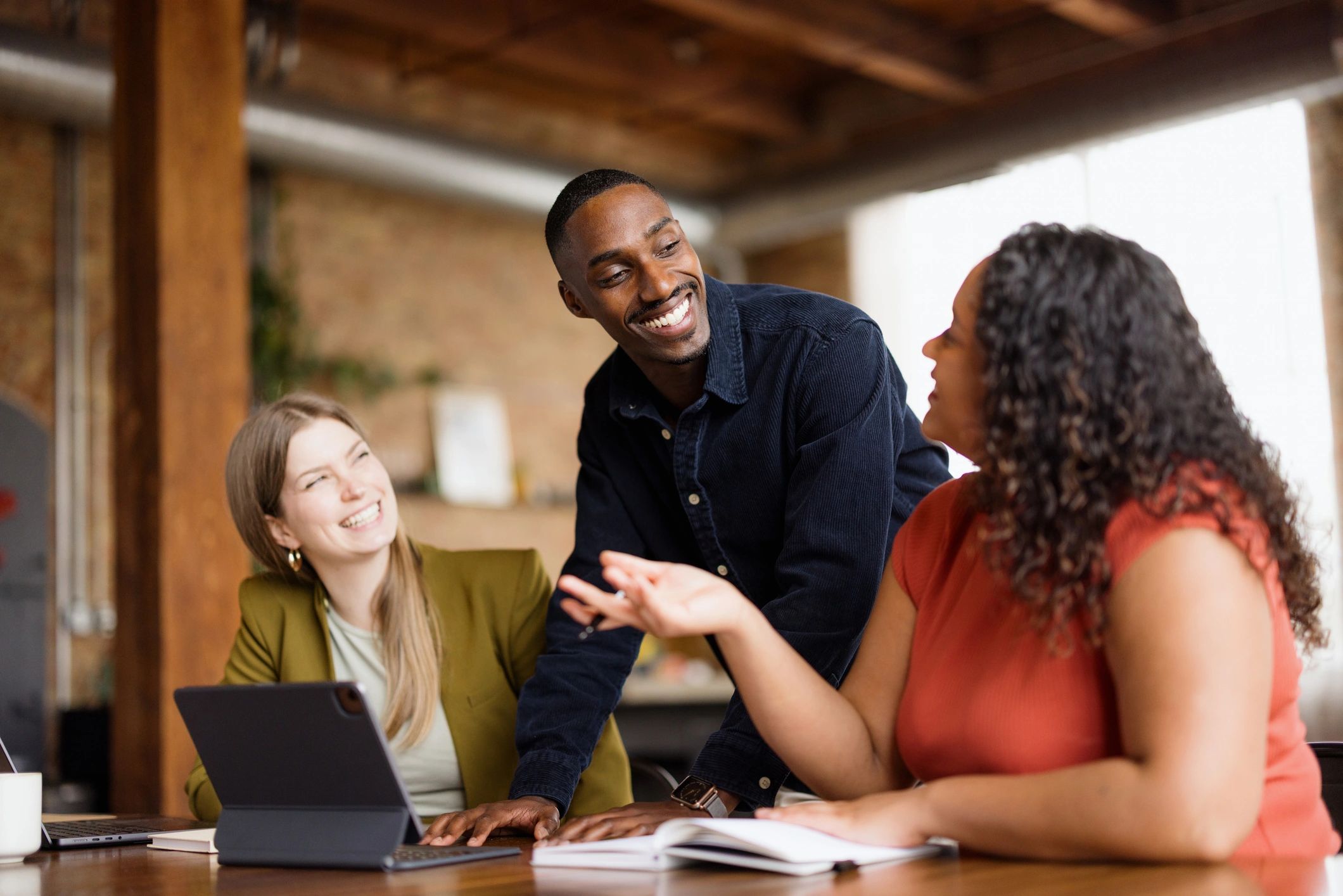 Colleagues collaborating during a professional meeting